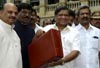 Budget 2013: Karnataka govt offers rice at Rs 2/kg in please-all budget